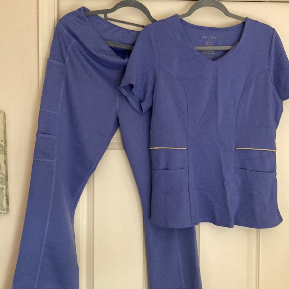 Jaanuu light blue scrub set   Top size L and bottom size M.